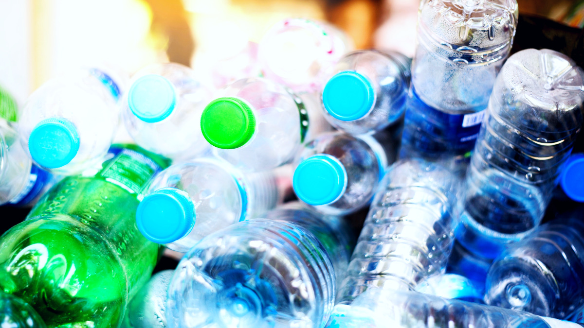 Pile of plastic bottles highlighting environmental impact, supporting Cleartide hydration solutions and sustainability efforts in reducing plastic waste.